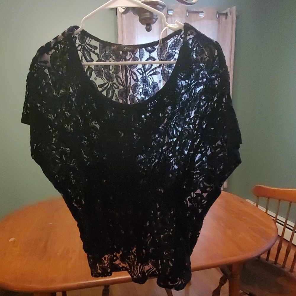 black, short-sleeve, sheer lace top. Medium